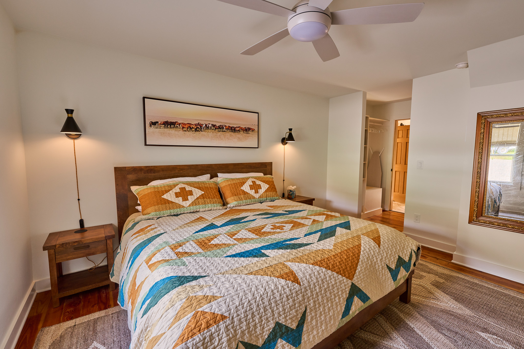Primary bedroom with ceiling fan